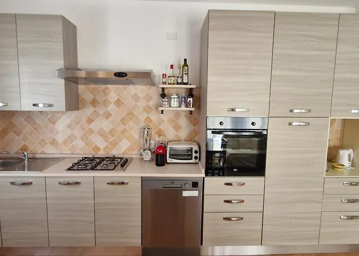 Апартаменты Capo Figari 13, Spazioso Nel Centro Di Con Terrazza Vista Mare, Wi-fi, Parcheggio Gratuito *